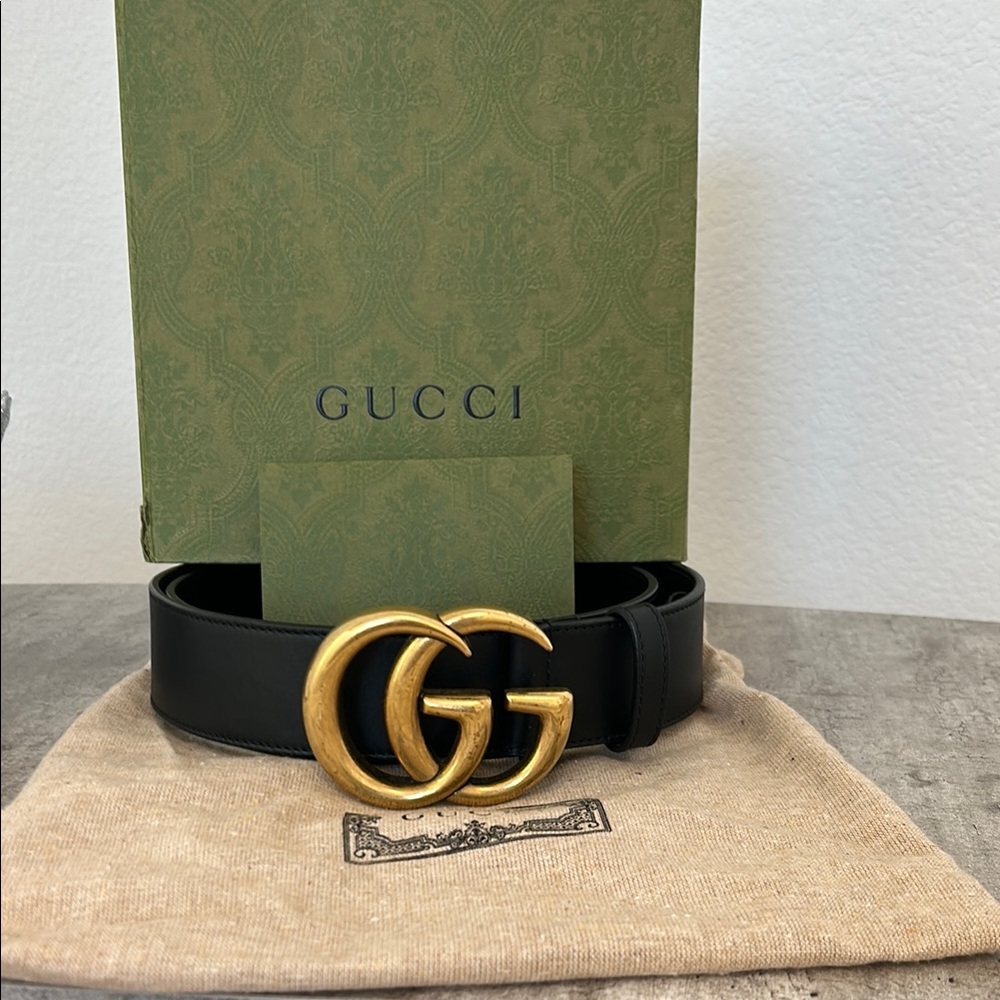 Gucci Black and Gold Belt with Iconic Double G Buckle